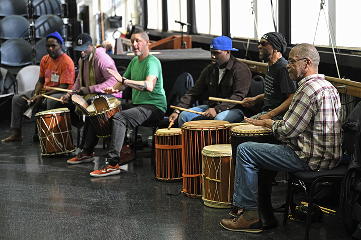 Drummers drum during an Igniting Emancipatory Possibilities through African Diaspora Dance Summit workshop.