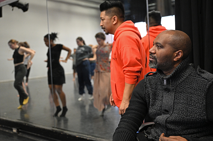 Choreographer Ronald K. Brown of the EVIDENCE Dance Company watches as dancers participate in a workshop he's leading.