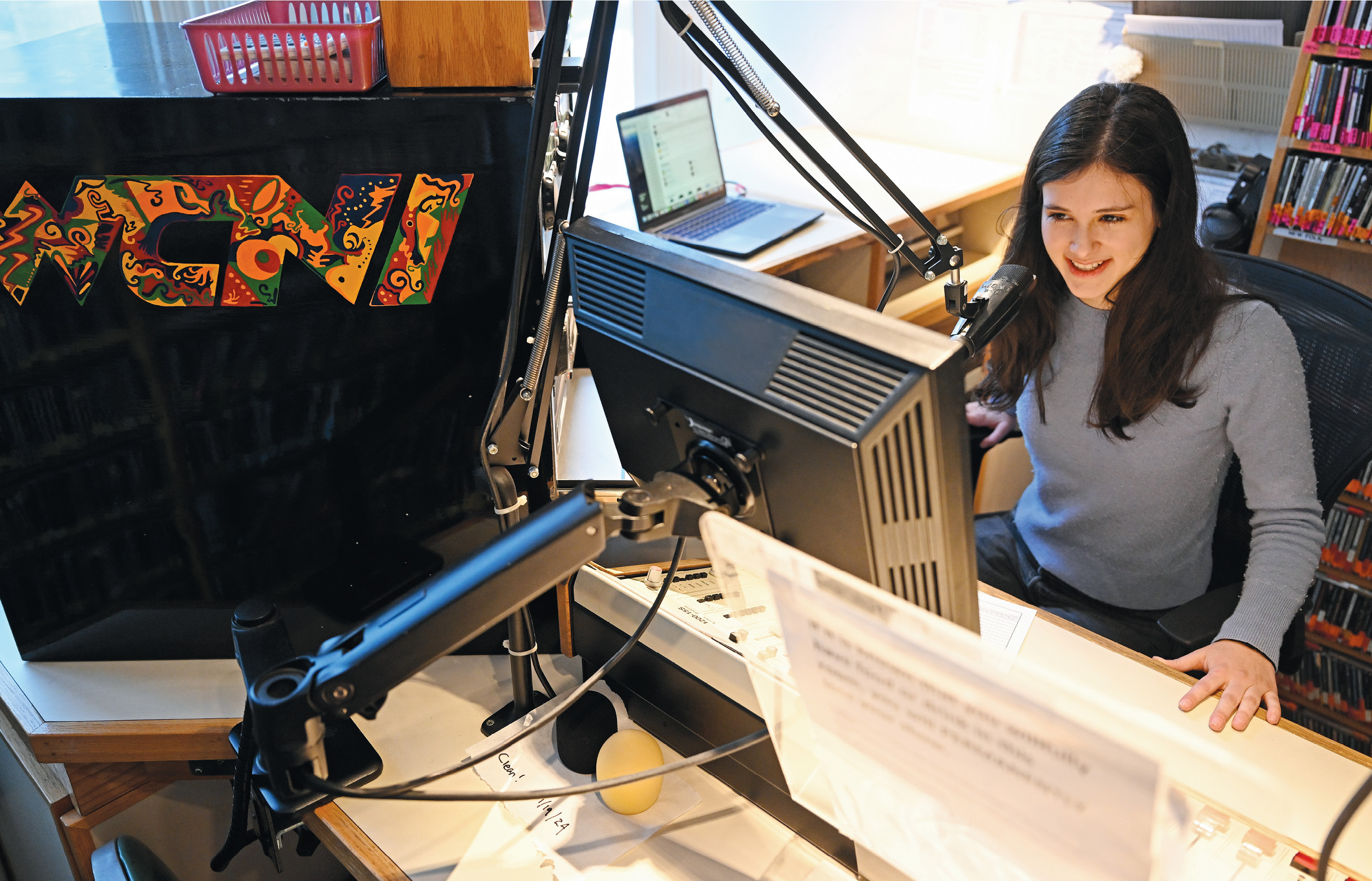 WCNI Student General Manager Riley Madden ‘26 helms the broadcast booth at the student radio station.