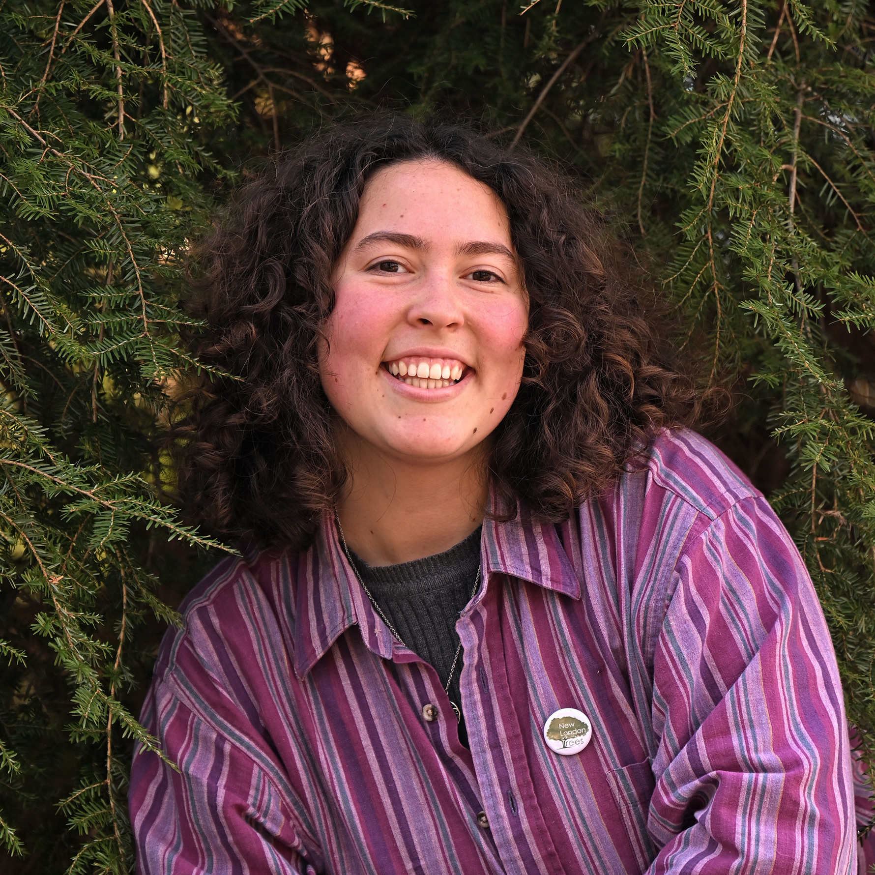 Paloma Doyle ’26 among the trees in the arboretum