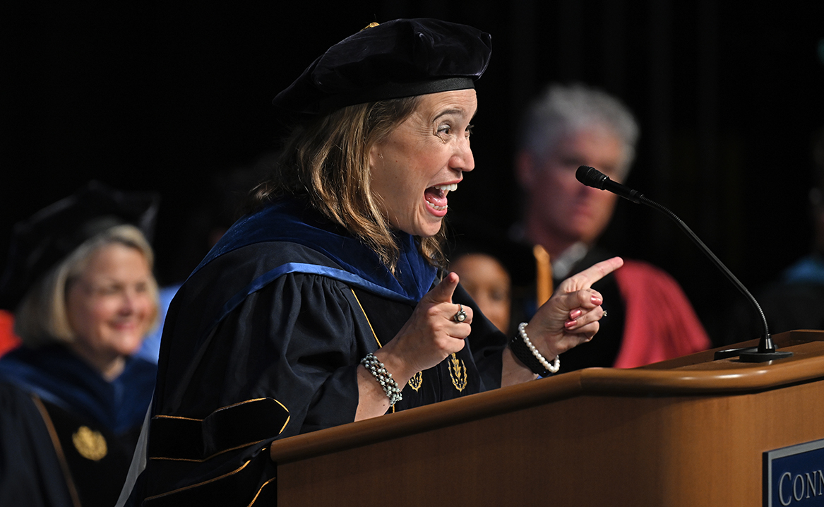 Associate Professor of Economics Mónika López Anuarbe gives the keynote address at Convocation.