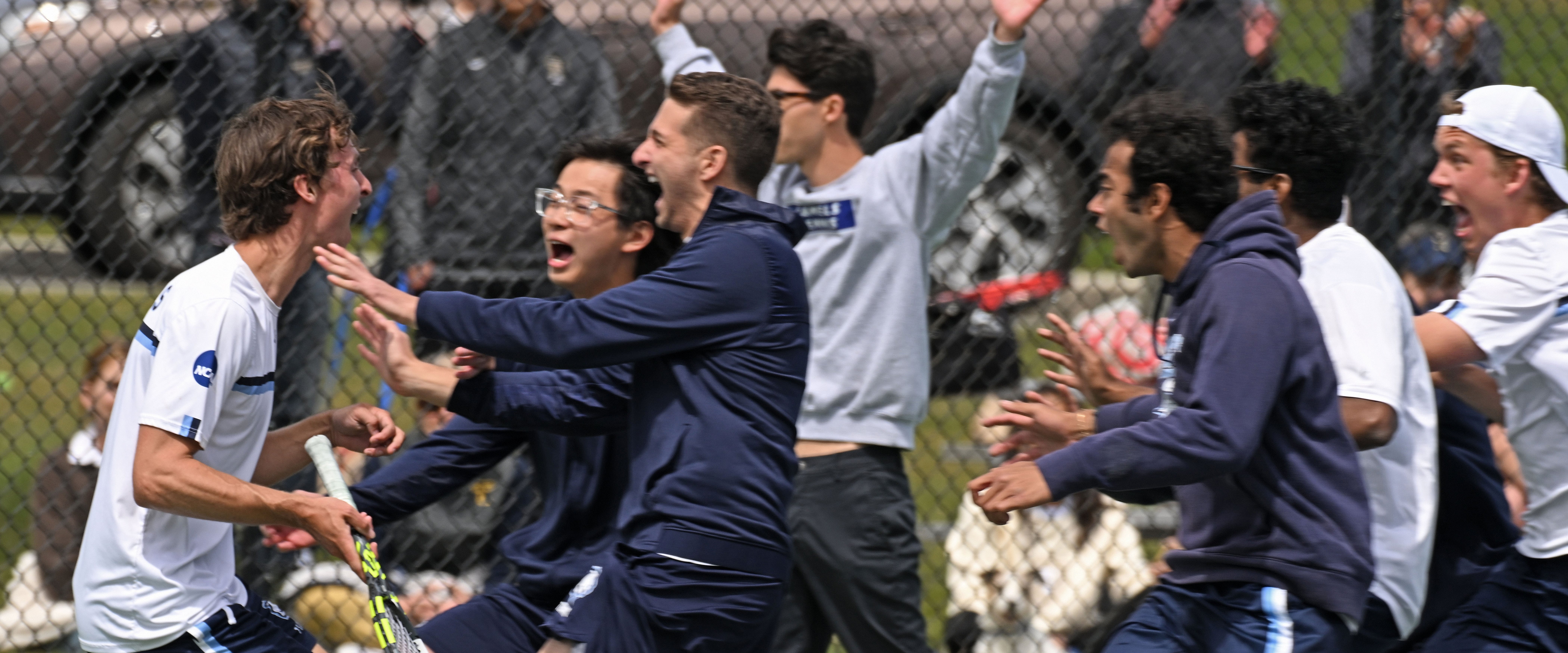 tennis players celebrate a big win